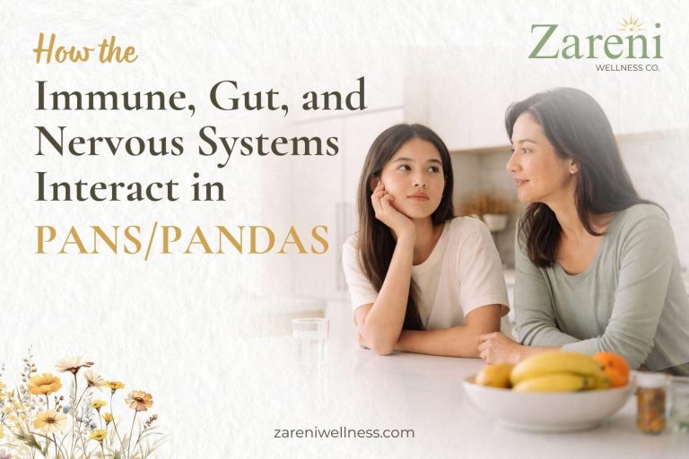 Mother and daughter sitting at a kitchen table talking together about PANS/PANDAS gut brain connection and how the immune, gut, and nervous systems interact in children.